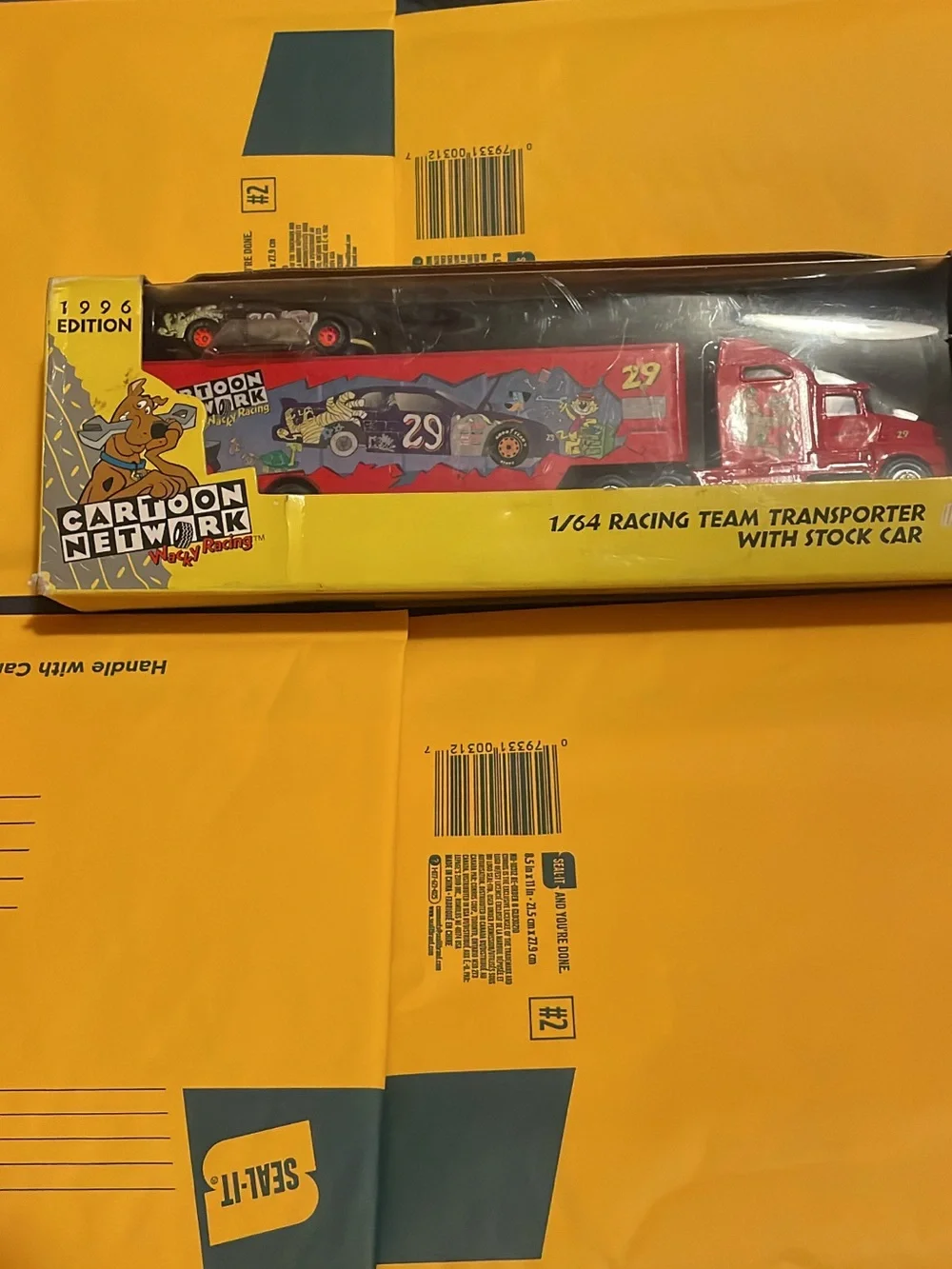 Racing Team 1/64 Red Racing Transporter with Stock Car
